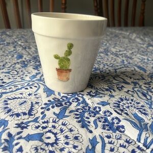White Ceramic Planter with Green Cactus Illustration